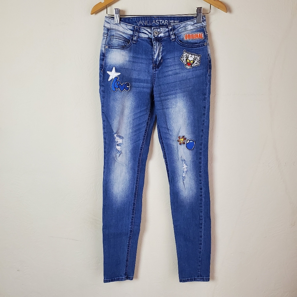 Distressed Patched Mid Rise Skinny Jeans